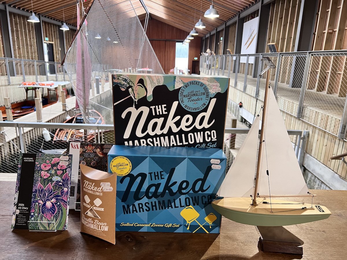 The Naked Marshmallow Co gift sets, 2026 diaries and model boat on display in the Boathouse.